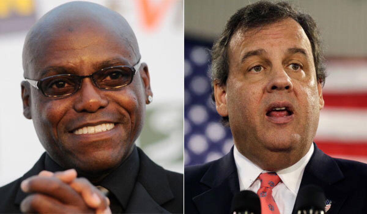 Former Olympian Carl Lewis, left, says New Jersey Gov. Chris Christie tried to use his power to keep him from running for state Senate in 2011.