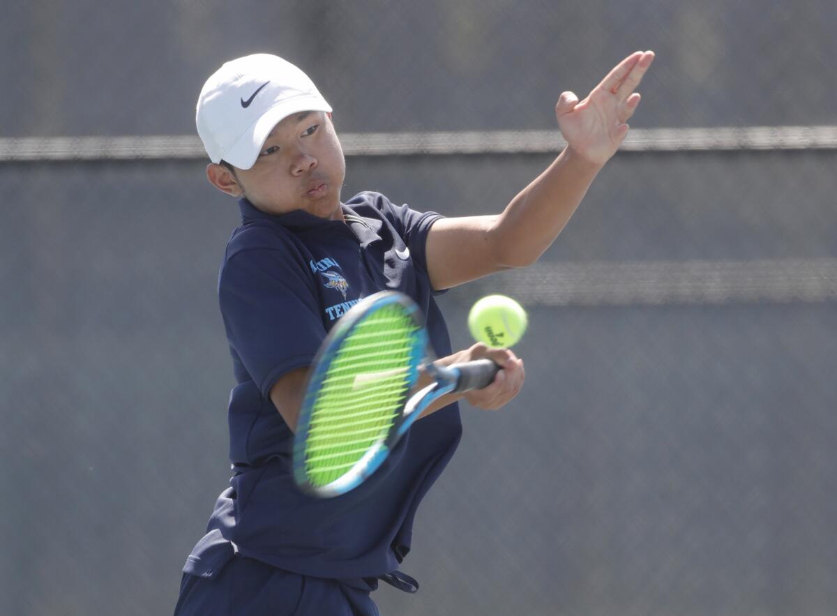 Marina's Vincent Hoang hits a solid forehand for a point during Wednesday's match.
