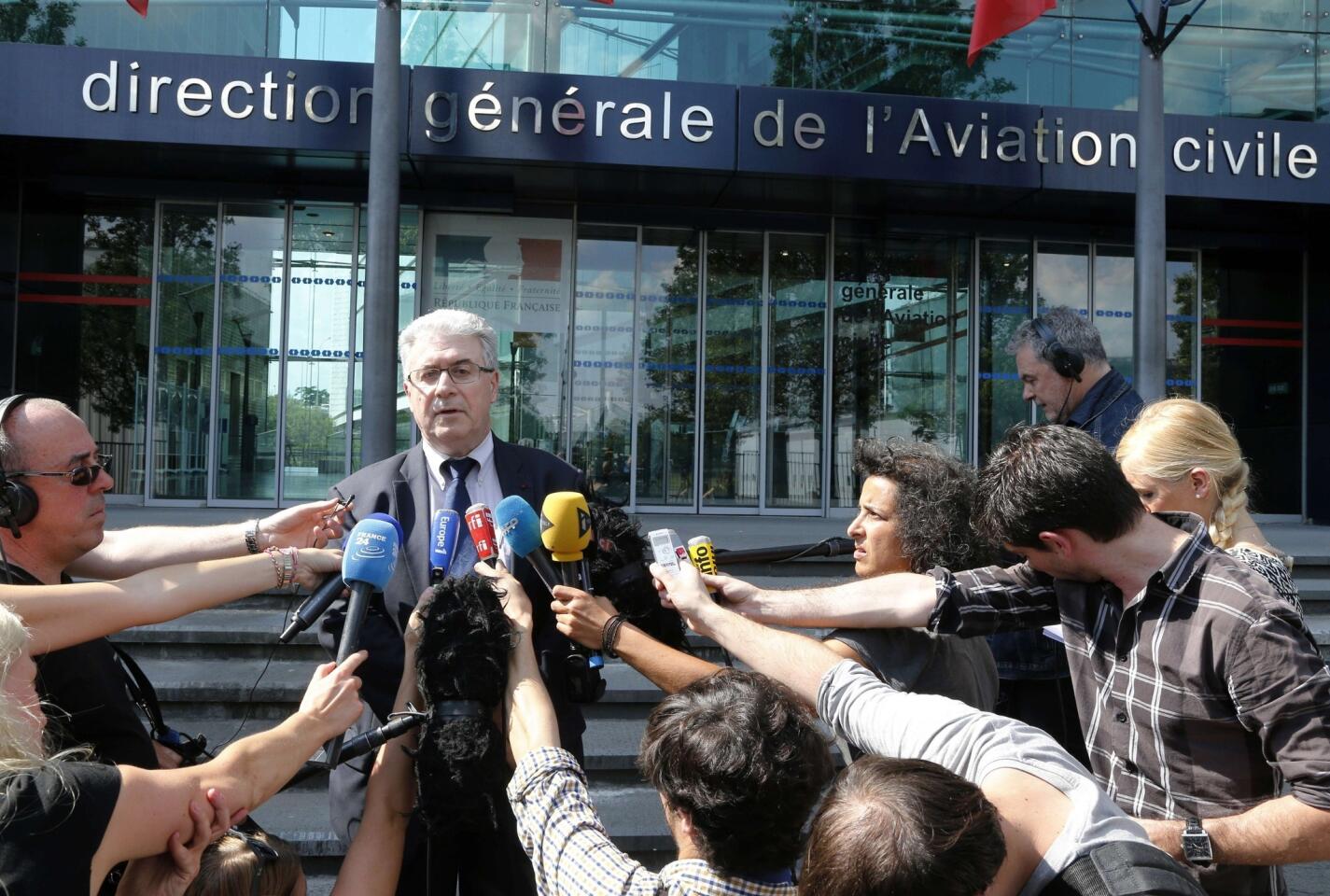 Patrick Gandil, head of the French Civil Aviation Authority, speaks to journalists in Paris about the crash of an Air Algerie plane with 116 people on board.