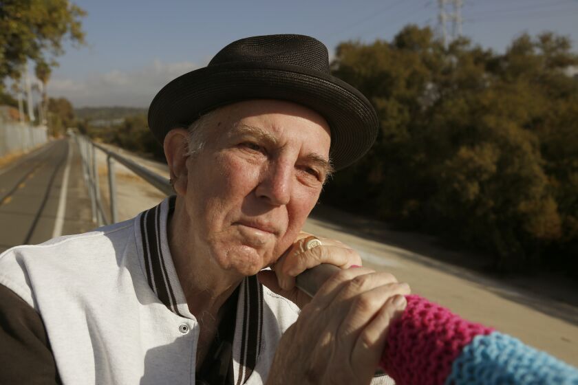 LOS ANGELES, CA., NOVEMBER 17, 2016: Lewis MacAdams leans his head on a railing along a green stretch of the Los Angeles River in Elysian Valley, a few miles north of downtown Los Angeles November 17, 2016. MacAdams, a local poet and lifelong environmental activist dedicated to restoring the Los Angeles River to a semblance of its natural state, is stepping down from his position as Director of Friends Of The Los Angeles River and is passing the torch to Marissa Christiansen November 17, 2016 (Mark Boster/ Los Angeles Times).