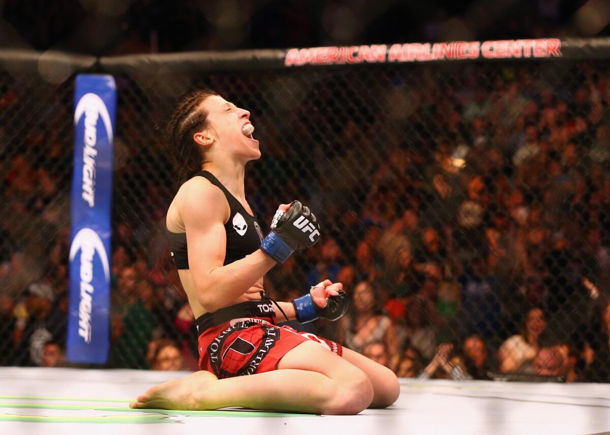 Joanna Jedrzejczyk celebrates a TKO against Carla Esparza during UFC 185 in Dallas in March 2015.