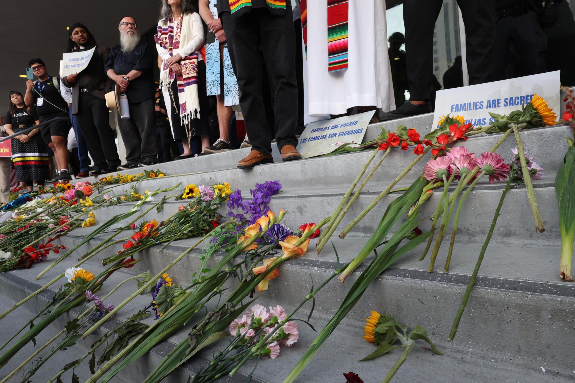 Flowers were left on the steps of the Federal Building in memory of all who were abducted in ICE raids.