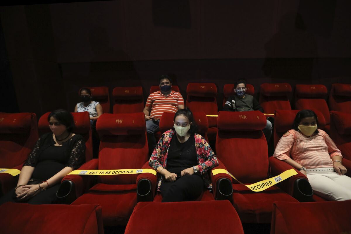 Viewers at a special screening of a Bollywood movie as cinemas reopen in New Delhi, India, on Oct. 15, 2020. 