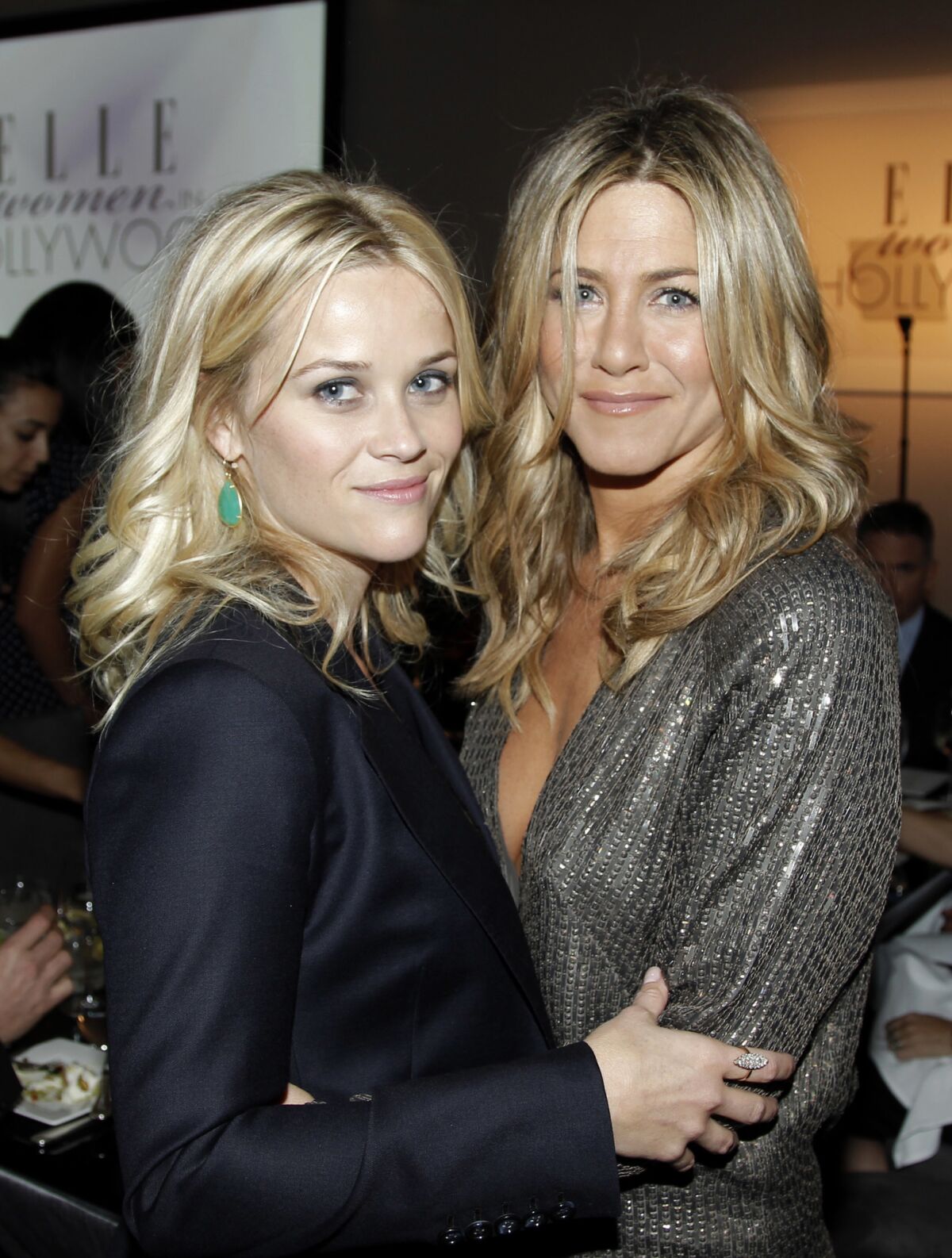 Jennifer Aniston, right, and Reese Witherspoon at the 18th Elle Women in Hollywood celebration in 2011. The two now star in the new Apple TV+ series "The Morning Show."