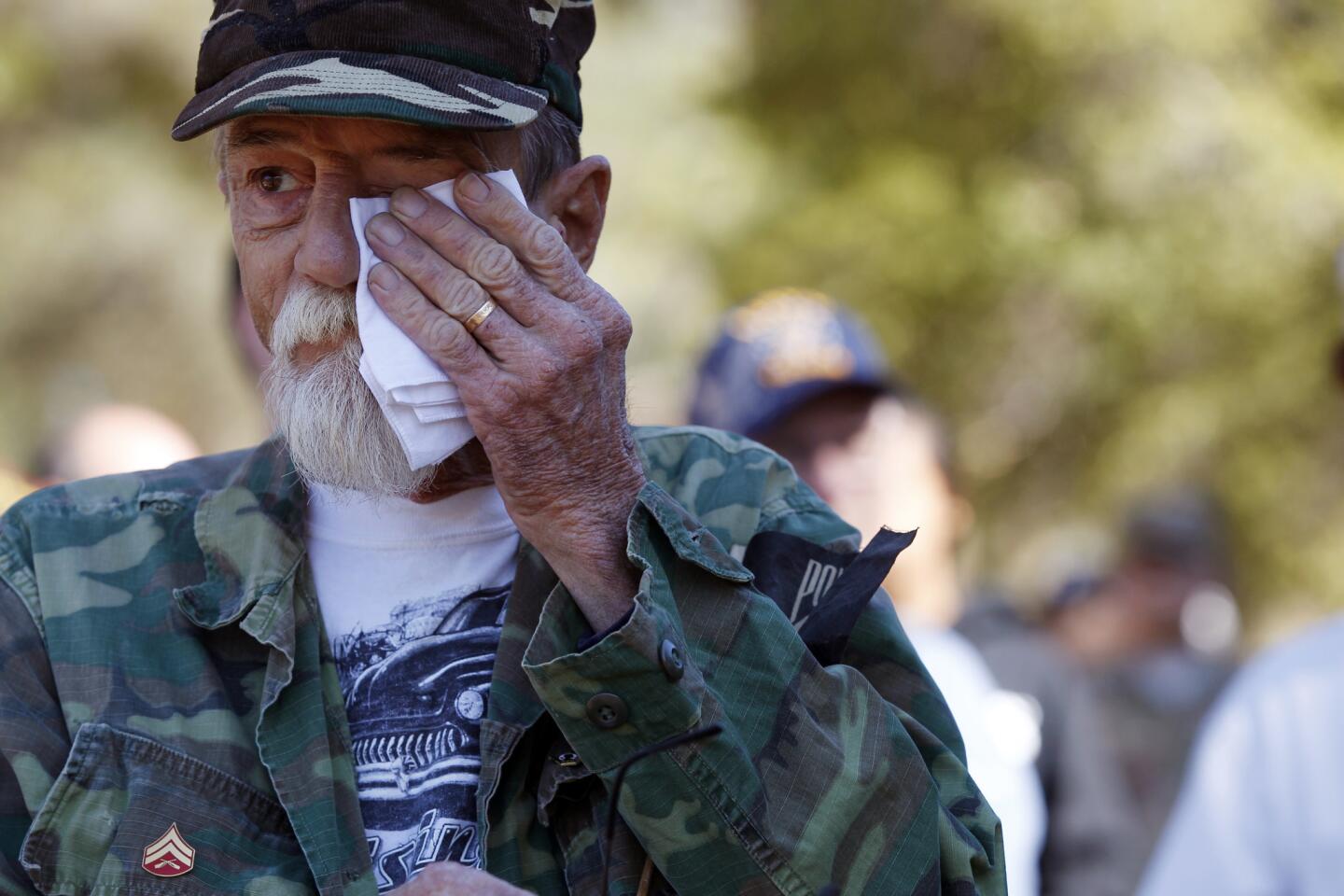 Mike Raczka, a USMC Vietnam veteran, wipes tears during recognition of POW/MIAs during Veterans Day ceremony at Hillcrest Park in Fullerton.