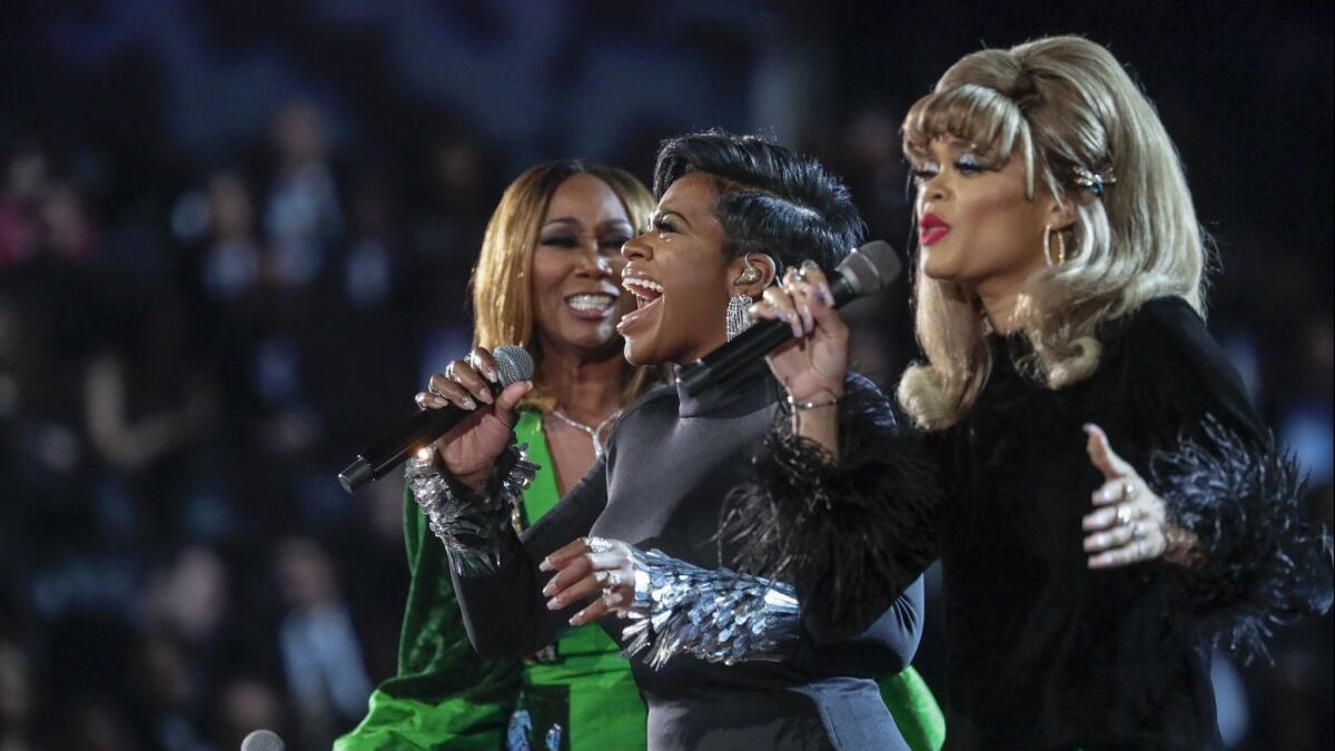 From left to right, Yolanda Adams, Fantasia Barrino and Andra Day perform a tribute to Aretha Franklin during the 61st Grammy Awards.