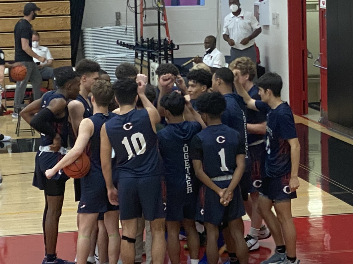 Chaminade basketball players gather before their upset win over Harvard-Westlake.