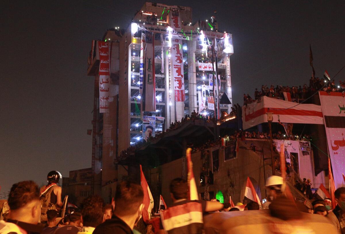 The Saddam Hussein-era building known as the Turkish Restaurant overlooks Tahrir Square, the Tigris River and the Green Zone, and protesters who took it over on Oct. 25 have sworn not to leave it.