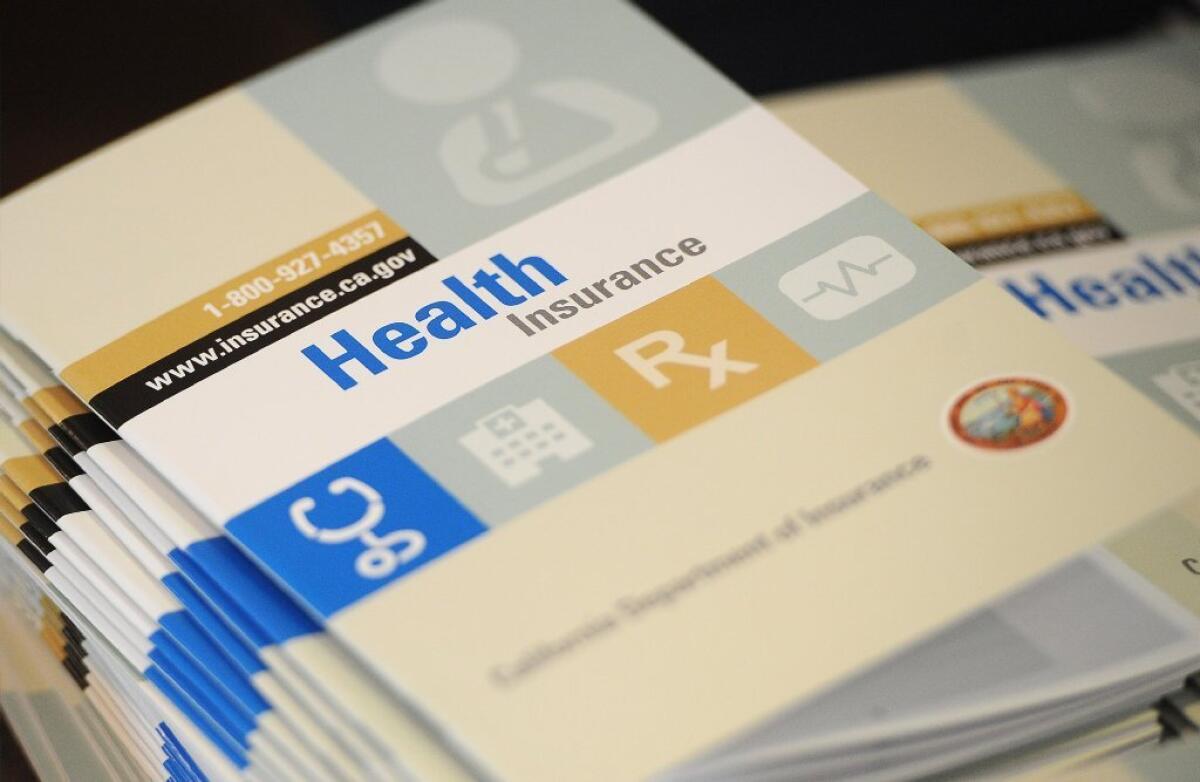 State insurance exchanges -- a centerpiece of President Obama's healthcare reform law -- begin their first open enrollment Tuesday. Above, booklets outlining health insurance options for Californians.
