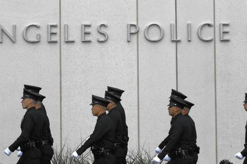 L.A. Mayor Eric Garcetti said in his State of the City address that he would be shifting 200 officers from elsewhere in the Police Department to its Metropolitan Division, a group that fights crime in different areas of the city. Above, at LAPD headquarters.