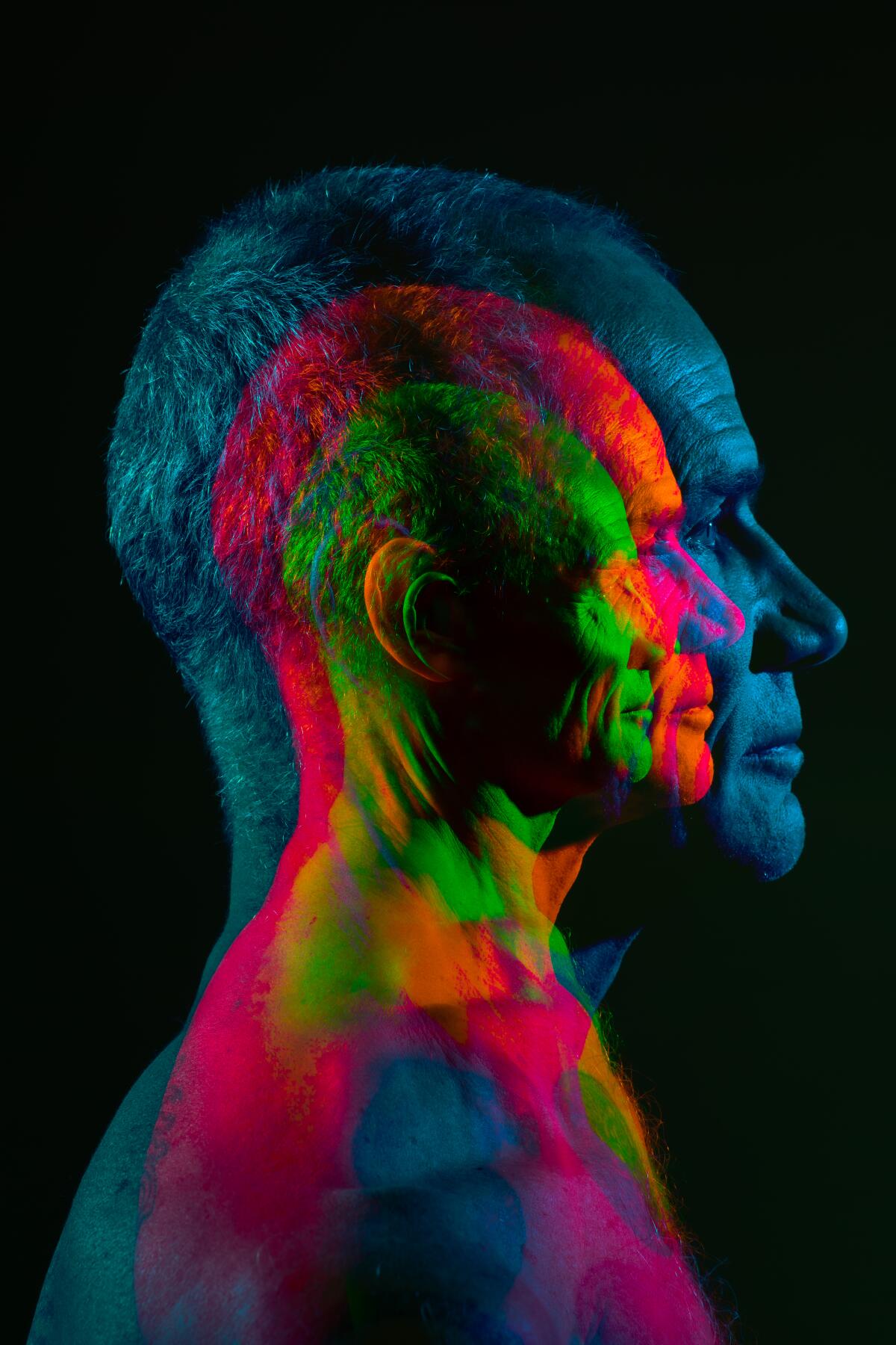 A multiple exposure in multiple colors of Flea's profile.