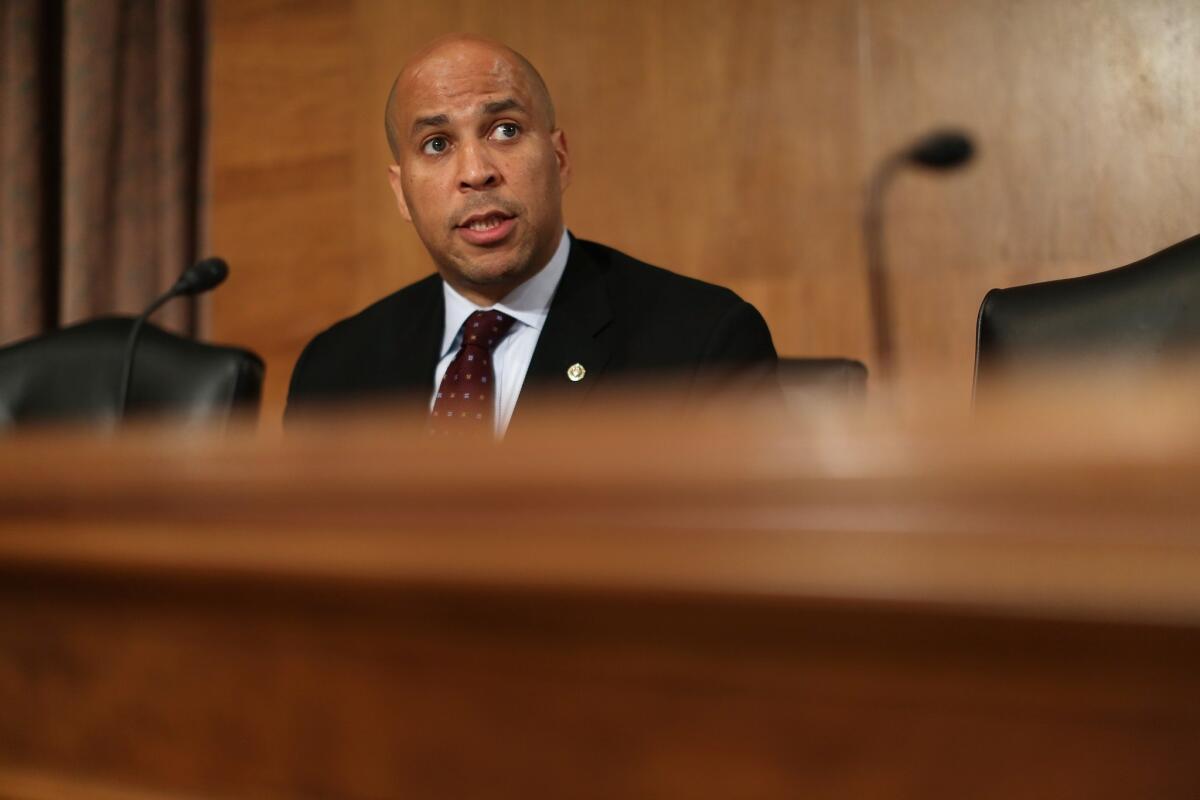 Sen. Cory Booker's plan would redirect tax money from the NFL to programs helping domestic abuse victims.