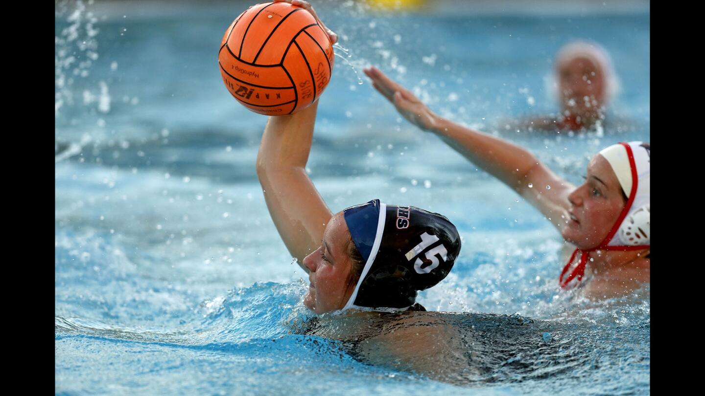 Shanna Davidson scores to give host Huntington Beach High an 11-10 lead in the first overtime against Murrieta Valley in the first round of the CIF Southern Section Division 2 playoffs on Wednesday.