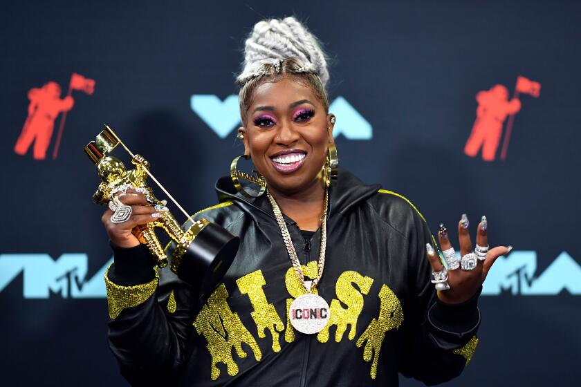 US rapper Missy Elliott poses in the press room with 'The Video Vanguard Award' during the 2019 MTV Video Music Awards at the Prudential Center in Newark, New Jersey on August 26, 2019. (Photo by Johannes EISELE / AFP) (Photo credit should read JOHANNES EISELE/AFP/Getty Images)