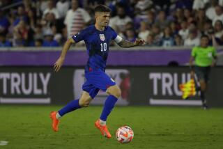 United States forward Christian Pulisic moves the ball against the El Salvador.