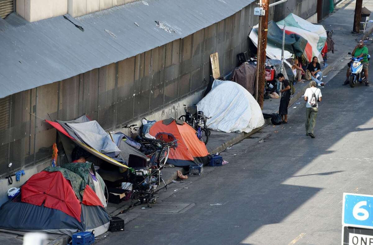 Tents are placed along Skid Row is seen in Los Angles on September 23, 2015. Los Angeles elected officials this week declared a homelessness "state of emergency" and pledged $100 million in funding to tackle the crisis. AFP PHOTO / ROBYN BECKROBYN BECK/AFP/Getty Images ** OUTS - ELSENT, FPG, CM - OUTS * NM, PH, VA if sourced by CT, LA or MoD **