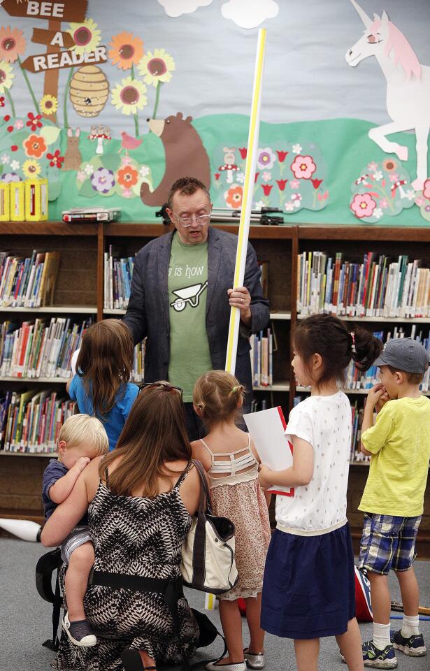 Photo Gallery: Comic juggler Michael Rayner performs for children at La Canada Library