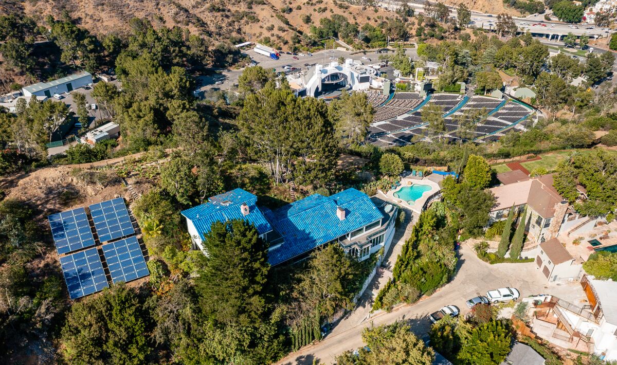 The scenic spot overlooks the Hollywood Bowl from a swimming pool, observation deck and three viewing decks.
