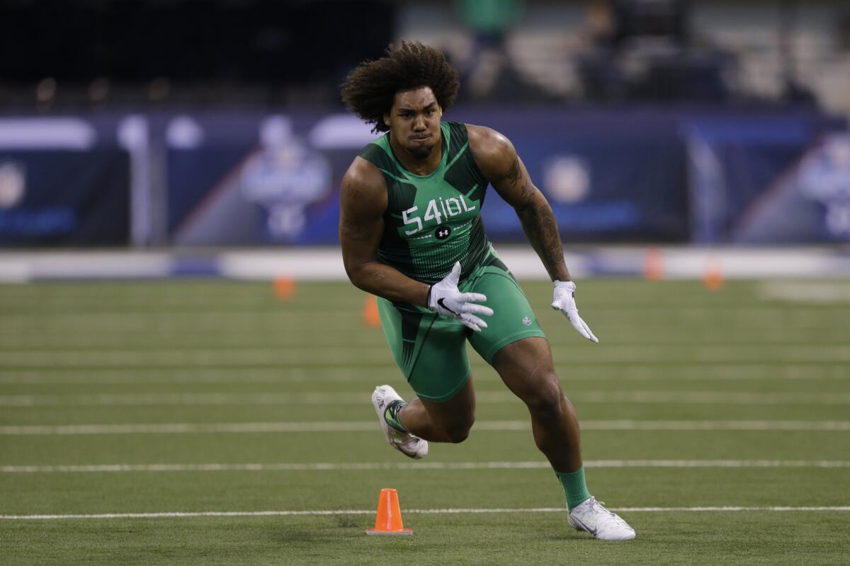 Former USC defensive lineman Leonard Williams sprints during a drill at the NFL scouting combine in Indianapolis on Feb. 22.