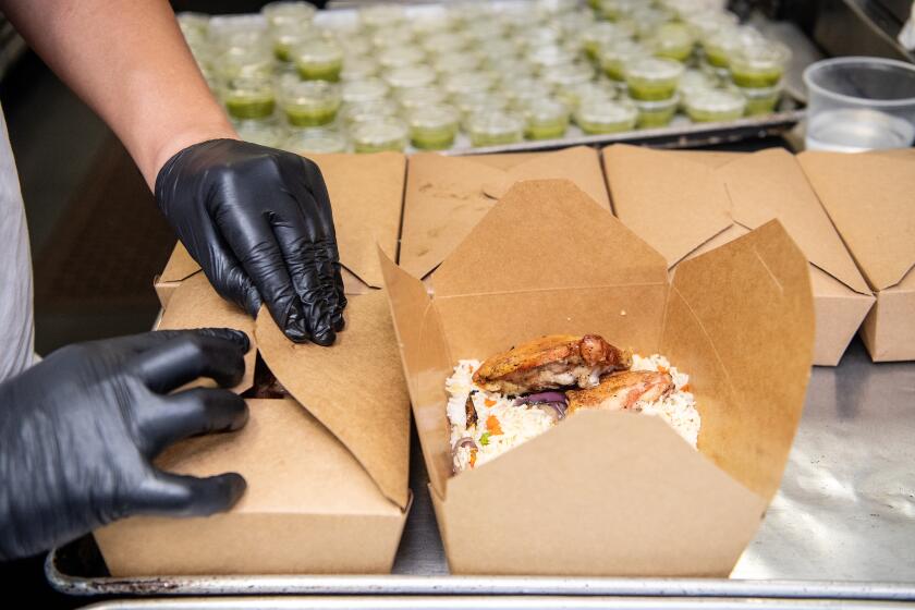 LOS ANGELES, CA- March 19, 2020: Nancy Silverton and staff prepare to offer over 300 meals, and other supplies, to those in the restaurant industry who have been effected by closures due to the Coronavirus pandemic on Thursday, March 19, 2020. (Mariah Tauger / Los Angeles Times)