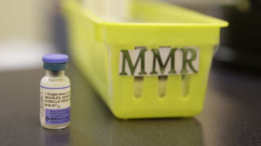 The measles, mumps and rubella vaccine sits on a counter at a pediatrics clinic in Greenbrae, Calif.