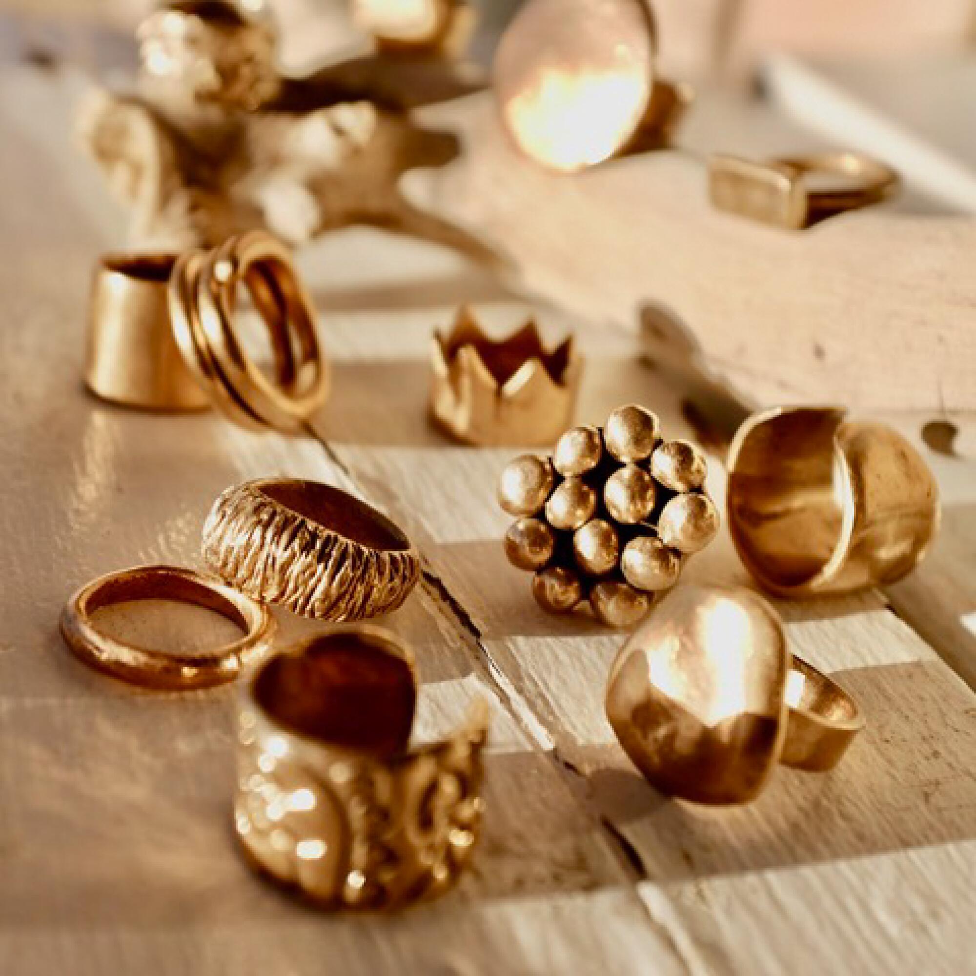 Assorted hand-sculpted bronze rings by Lili T.