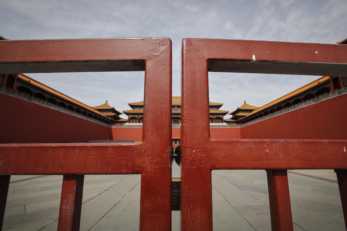 An entrance gate is closed in March at the usually crowded Forbidden City in Beijing because of the coronavirus outbreak.