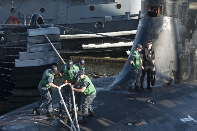 BREMERTON, Wash. (May 7, 2018) Sailors assigned to the Seawolf-class fast-attack submarine USS Connecticut (SSN 22) handle mooring lines as the boat returns home to Naval Base Kitsap-Bremerton after the completion of the multinational maritime Ice Exercise (ICEX) in the Arctic Circle. ICEX 2018 is a five-week exercise that allows the Navy to assess its operational readiness in the Arctic, increase experience in the region, advance understanding of the Arctic environment, and continue to develop relationships with other services, allies and partner organizations. (U.S. Navy photo by Mass Communication Specialist 1st Class Amanda R. Gray/Released)