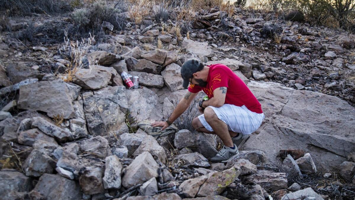 Friend and former volunteer Syrian fighter William Allard spends time at the spot where Kevin Howard committed suicide at the end of April. (Gina Ferazzi / Los Angeles Times)