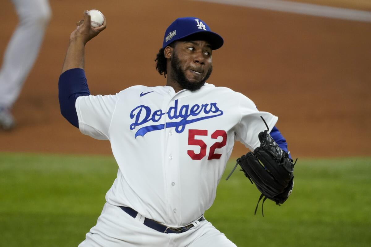Dodgers relief pitcher Pedro Baez delivers during the fifth inning of Game 2 of the NLCS against the Atlanta Braves.