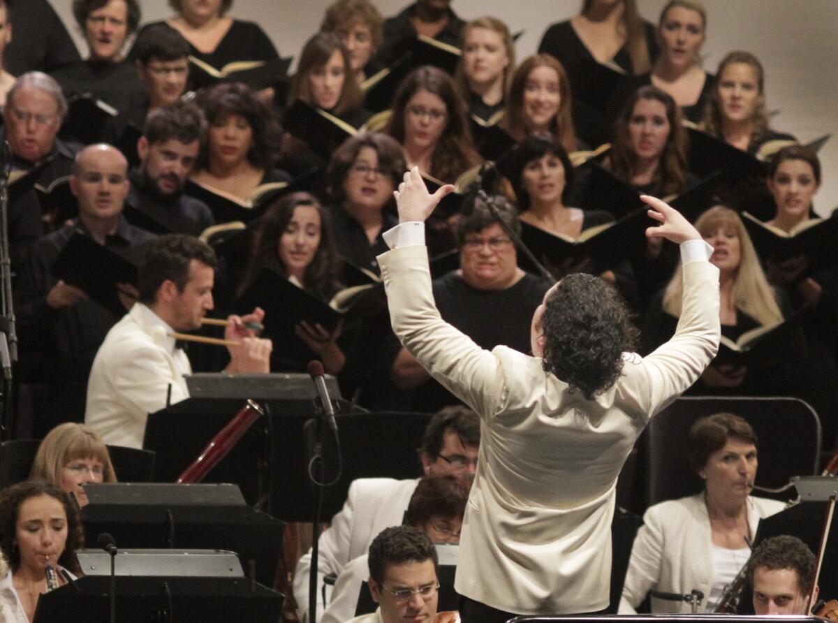 Gustavo Dudamel conducting the Los Angeles Philharmonic in Verdi's "Requiem" at the Hollywood Bowl on Aug. 13. L.A. County is considering raising ticket prices for the Phil at the venue.