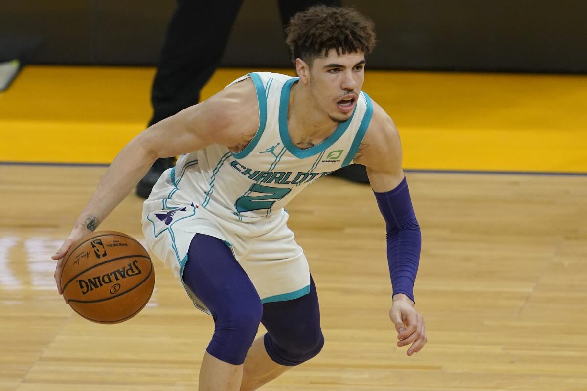 Charlotte Hornets guard LaMelo Ball plays against the Golden State Warriors on Feb. 26.