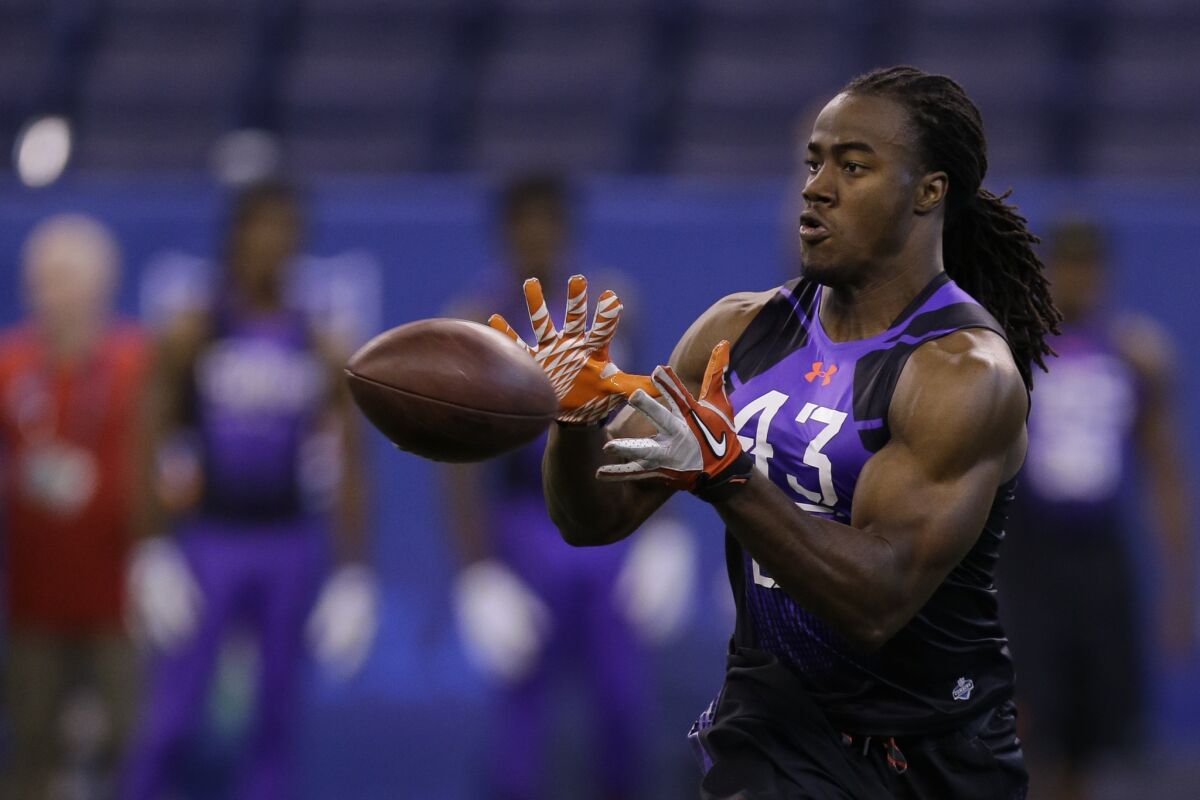 USC defensive back Josh Shaw catches a ball during a drill at the NFL scouting Combine in Indianapolis.