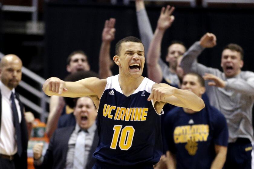 UC Irvine guard Luke Nelson celebrates after making a three-point shot against UC Santa Barbara in overtime of their Big West tournament semifinal on Friday night.