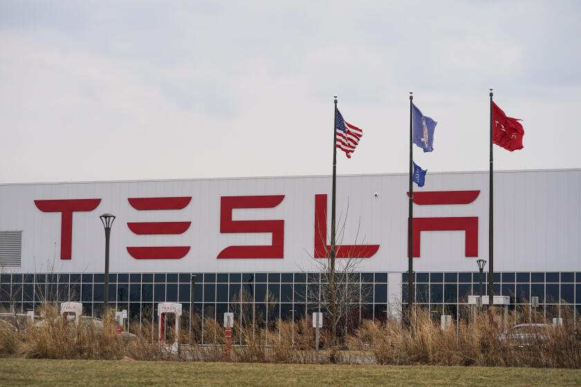File - Tesla Gigafactory 2 is shown Friday, March 18, 2022, in Buffalo, N.Y. Several employees at the factory have been fired after launching union organizing efforts two days ago, according to Tesla Workers United. (AP Photo/Frank Franklin II, File)