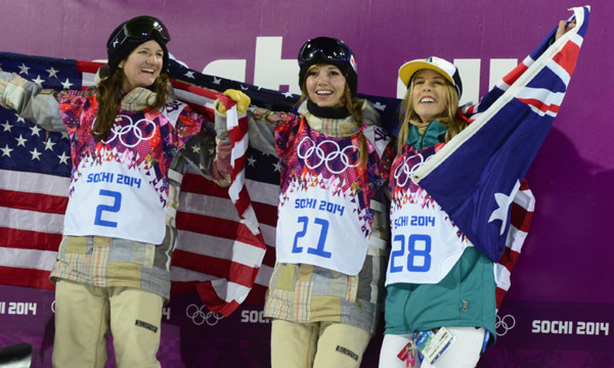 American bronze medalist Kelly Clark, left, and American gold medalist Kaitlyn Farrington, center, celebrate with Australia silver medalist Torah Bright following their performances in the snowboard halfpipe final at the Sochi Winter Olympic Games on Wednesday.