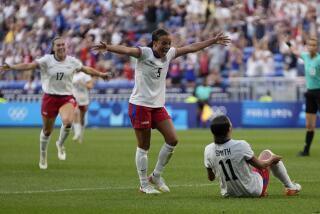 American Sophia Smith celebrates with teammates after scoring against Germany 