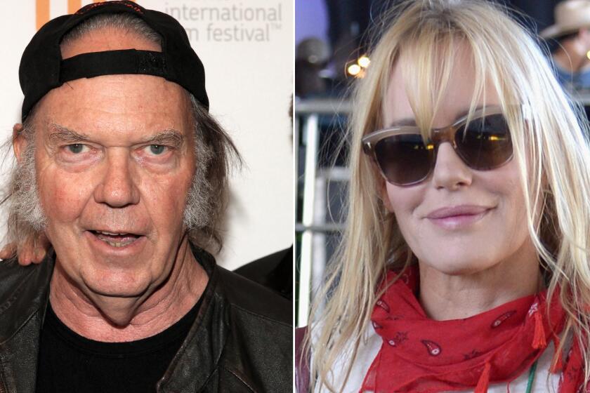 Neil Young and Daryl Hannah were spotted getting cozy in the L.A. area this week.