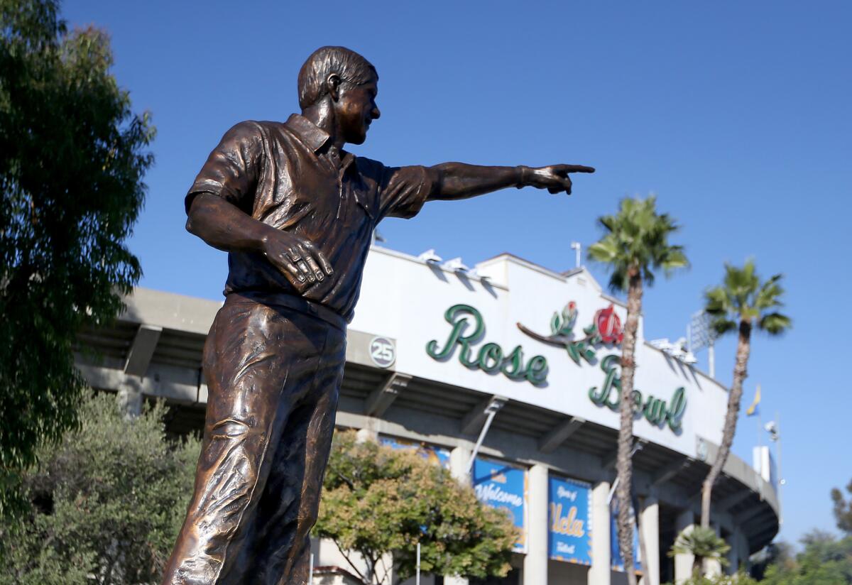 A statue of the UCLA football coaching legend Terry Donahue outside the Rose Bowl in Pasadena.