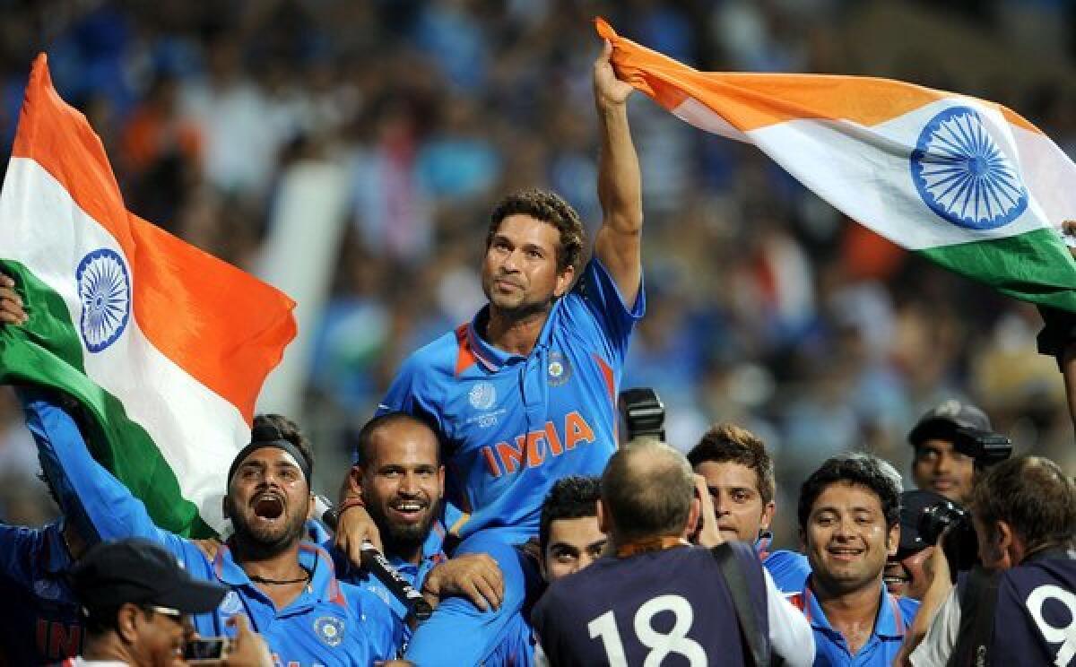 Indian batsman Sachin Tendulkar rides on his teammates' shoulders after India defeated Sri Lanka in the 2011 ICC Cricket World Cup final in Mumbai.