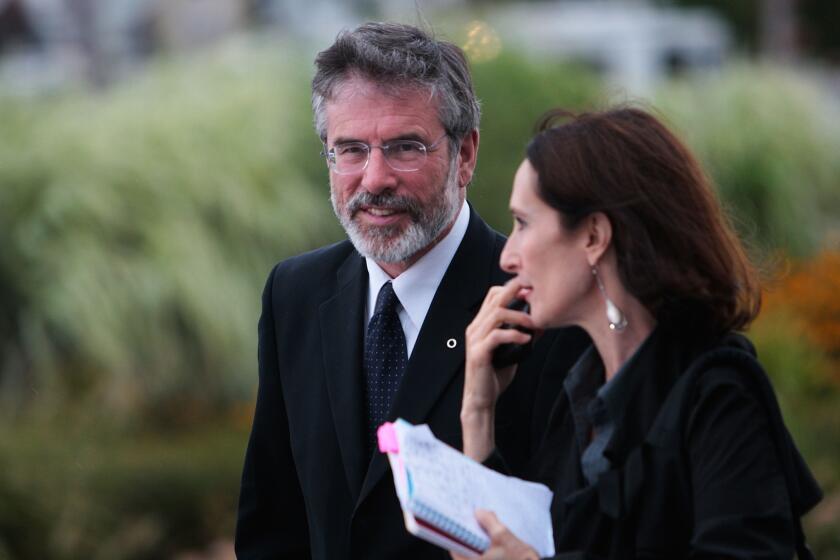 Sinn Fein leader Gerry Adams, seen here in Boston in 2009, was arrested on Wednesday in Northern Ireland in connection with the Irish Republican Army's 1972 abduction and killing of a Belfast widow.