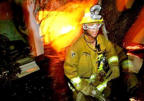 An L.A. firefighter retreats