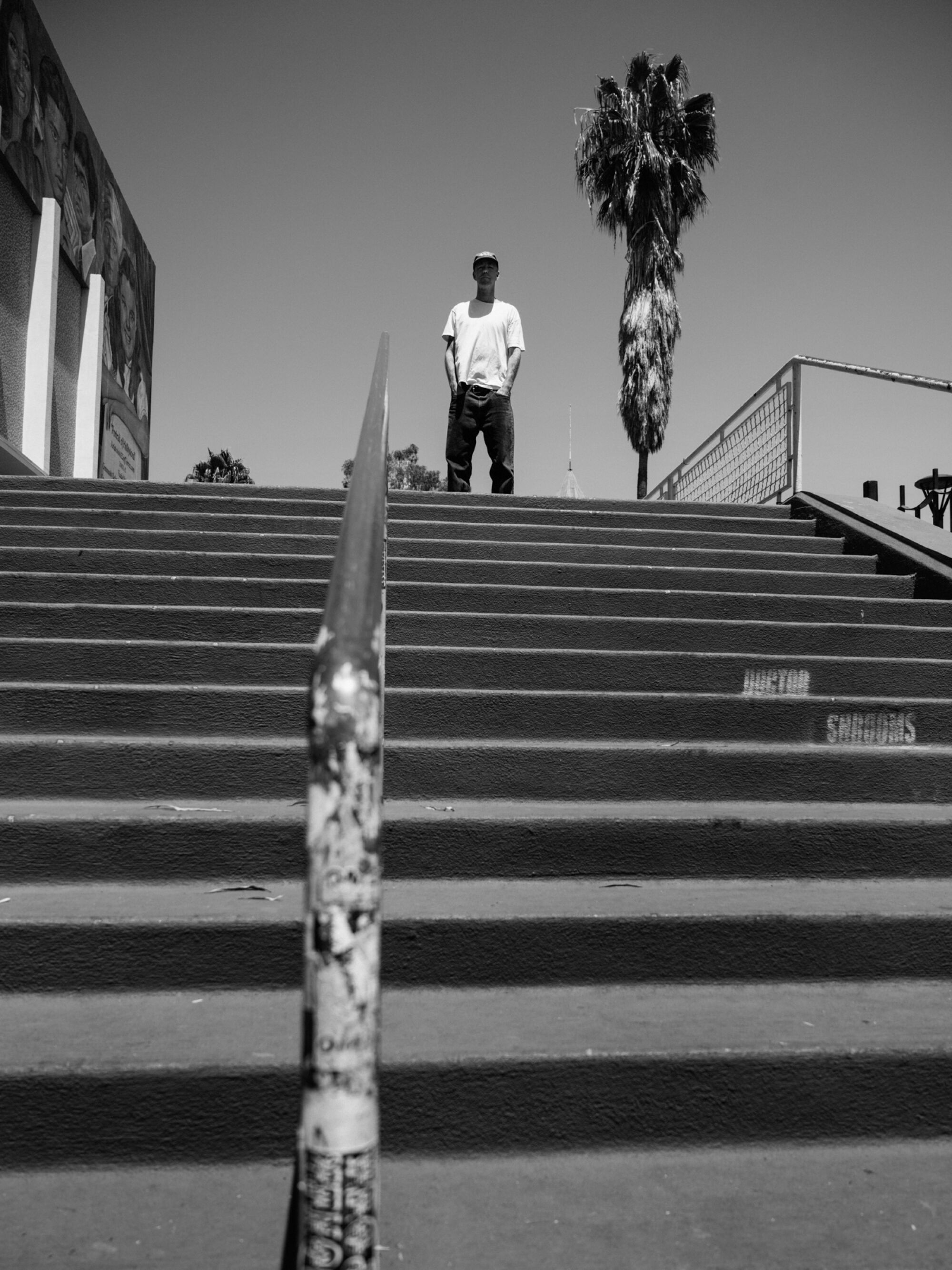 Andrew Reynolds stands atop Hollywood High's 16-stair.