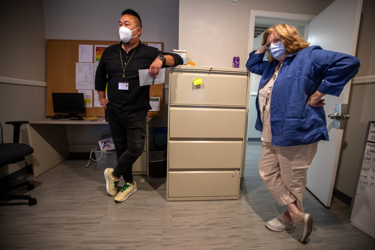 Luwin Kwan, left, a licensed clinician, and Suzanne Dewalt, a peer support specialist, at Sycamores in Altadena