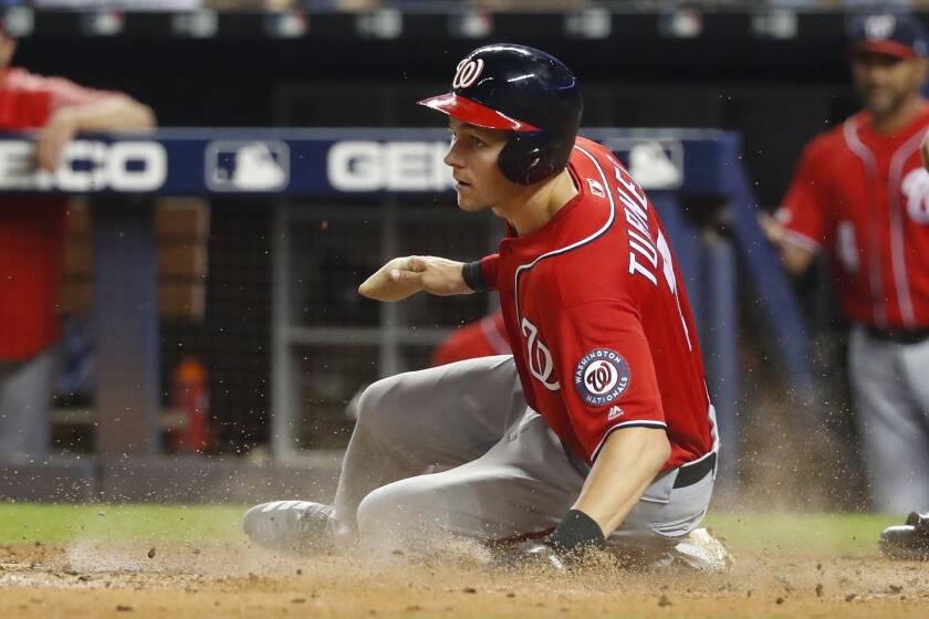Washington's Trea Turner slides home against the Marlins on Sept. 21, 2019, in Miami.