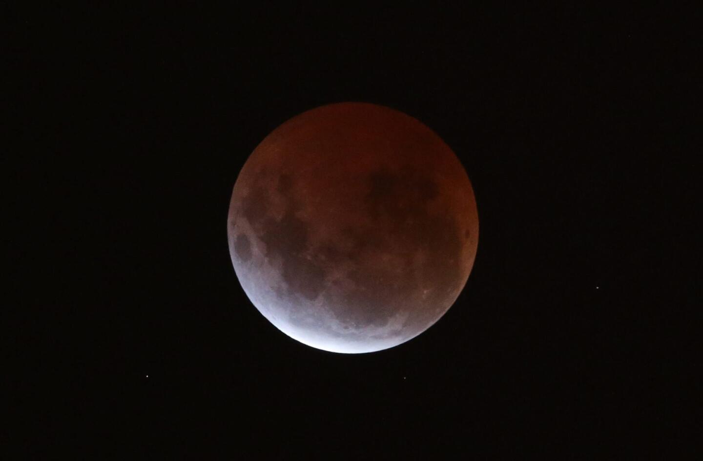 A lunar eclipse is seen from Melbourne, Australia, on Saturday.