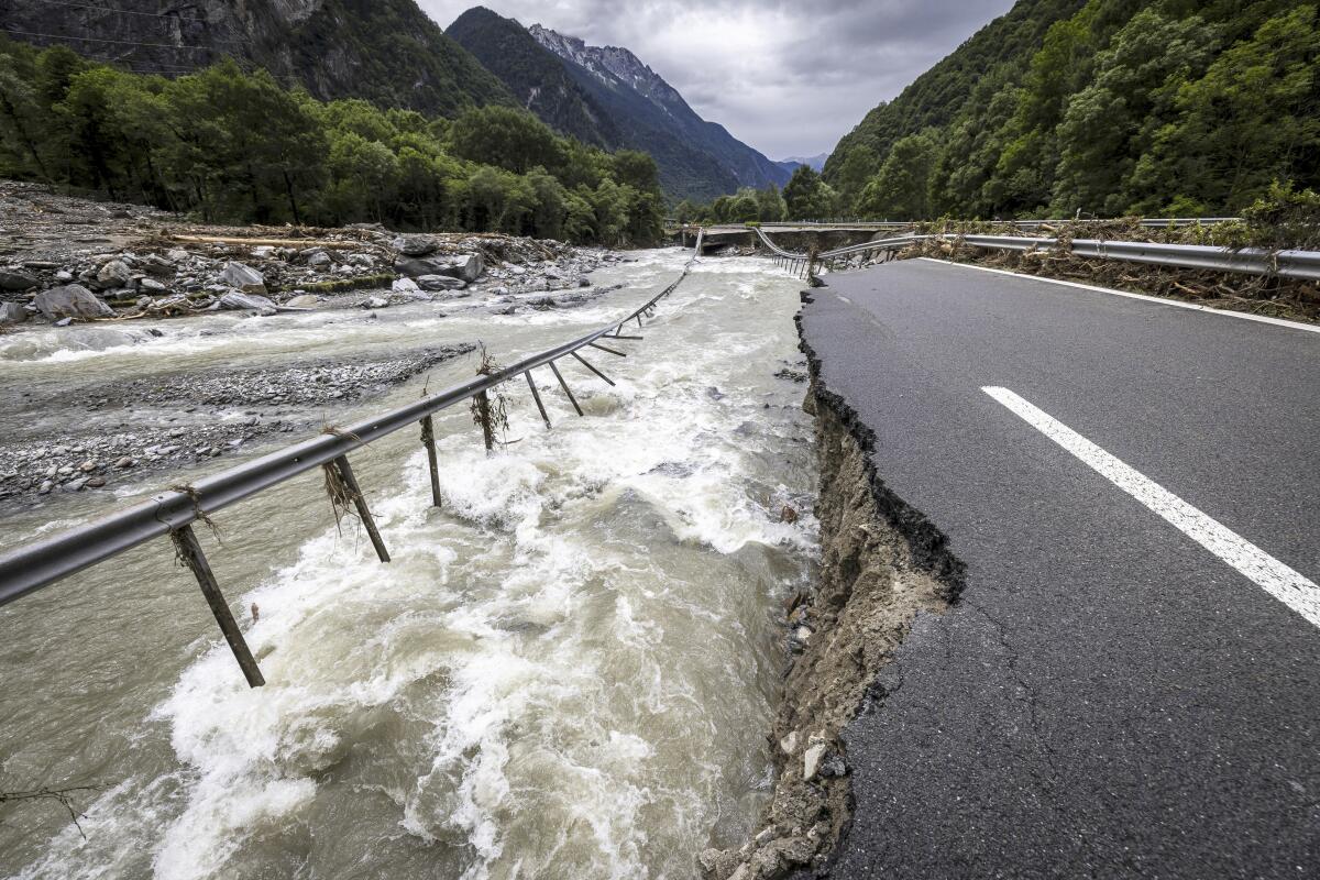 High water washes out a highway in Switzerland.