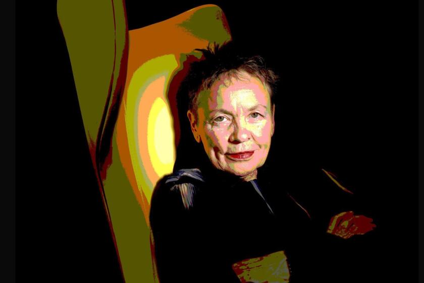 NEW YORK, NEW YORK--MARCH 29, 2018--PHOTO ILLUSTRATION-POLARIZING FILTER USED IN PHOTOSHOP--Performance artist Laurie Anderson at her home in Manhattan, NY photographed on March 29, 2019. (Carolyn Cole/Los Angeles Times)
