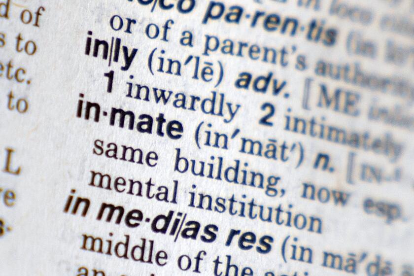 The word "inmate" appears in Webster's New World Dictionary in New York, Thursday, Aug. 11, 2022. New York has amended a series of state laws to remove the word "inmate" and replace it with "incarcerated person" to refer to people serving prison time. The changes, signed into law by Gov. Kathy Hochul, are intended to reduce the stigma of being in being in jail. Republicans ridiculed the measure as coddling criminals. (AP Photo/Mary Altaffer)