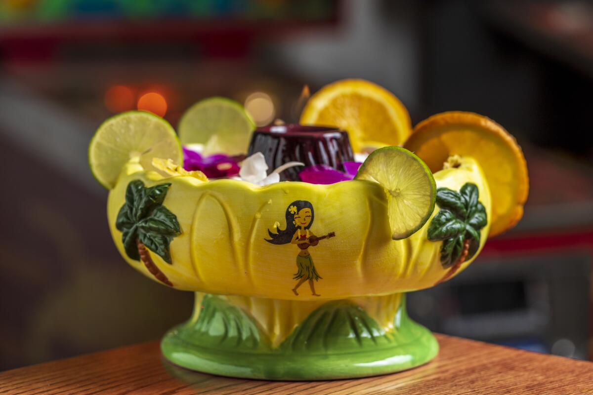 A yellow ceramic bowl for a large-format cocktail at Gin Rummy in Venice.